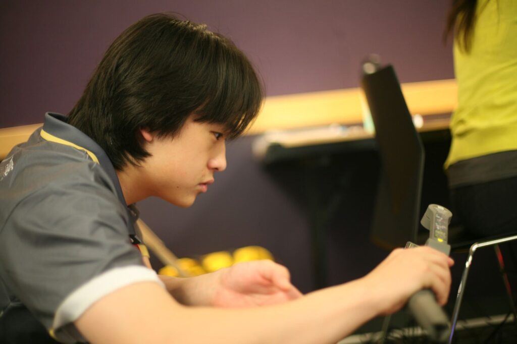 Team member working with a RoboMaster robot.