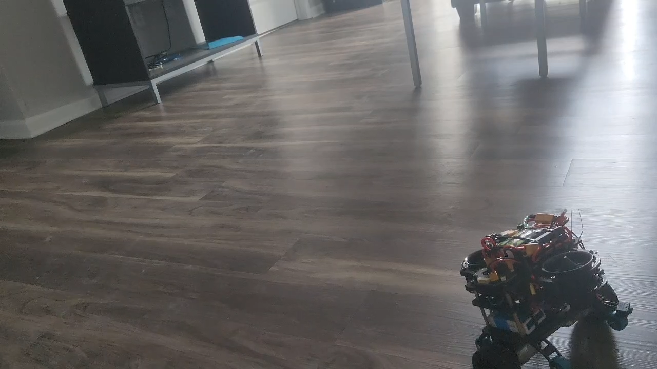 Ducted fan two-wheeled self-balancing robot prototype during a floor test.